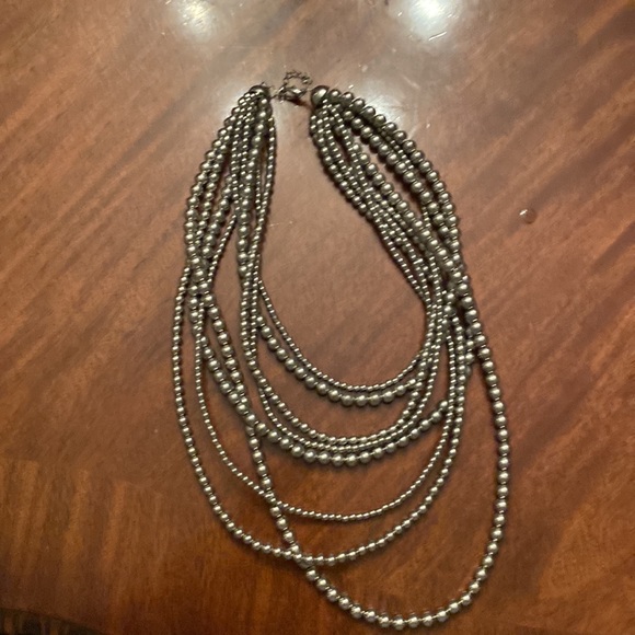 Silver toned, multi strand necklace with lobster claw clasp. - Picture 2 of 8